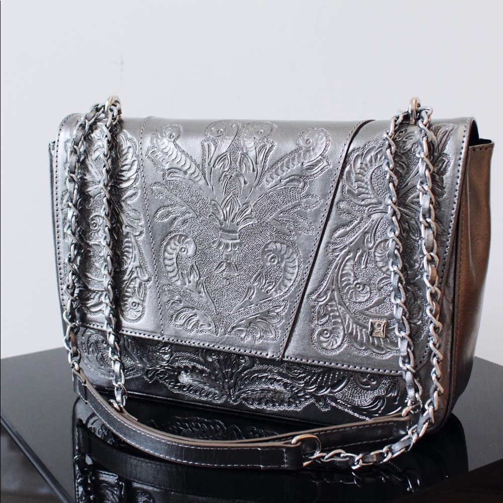 Carolina Crowley Chiseled leather clutch.